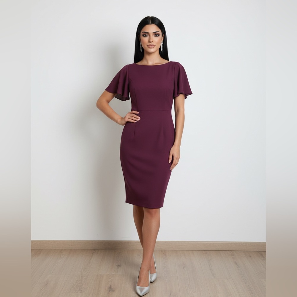 Calvin Klein Plum colored dress w/ sheer flowing top.  Size: 10